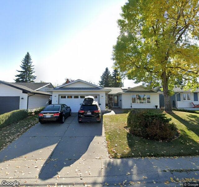 Street view of 1011 Lake Sylvan Drive SE, Calgary