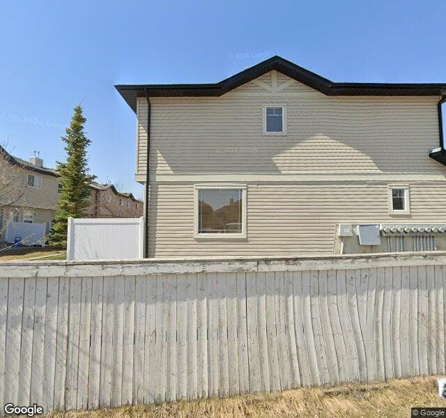Street view of 111 Saddlebrook Point NE, Calgary