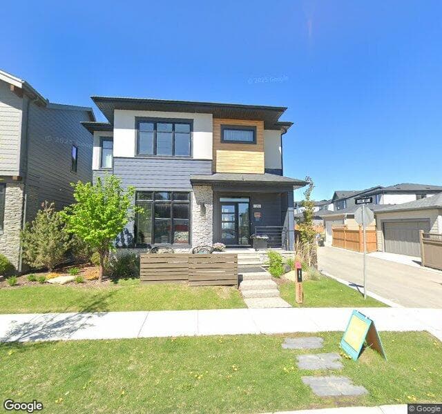 Street view of 21 Treeline Manor SW, Calgary