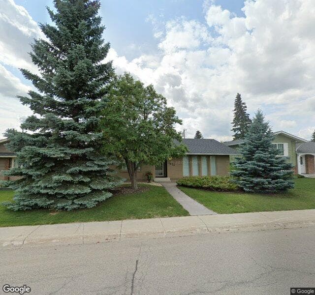 Street view of 1574 Lake Bonavista Drive SE, Calgary