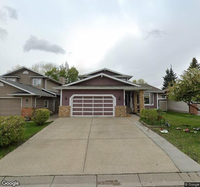 Street view of 37 Sun Canyon Way SE, Calgary