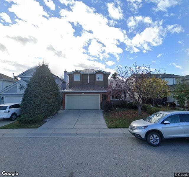 Street view of 18 Riverside Close SE, Calgary
