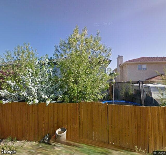 Street view of 135 Sunset Place SE, Calgary