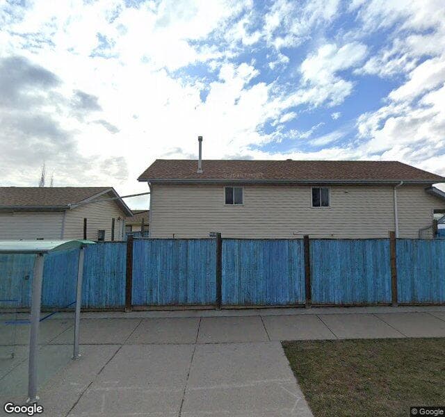 Street view of 4 Erin Grove Bay SE, Calgary