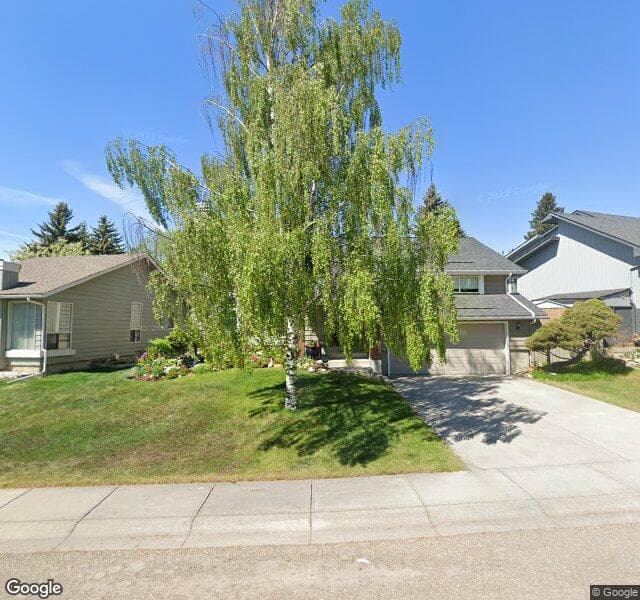 Street view of 835 Coach Side Crescent SW, Calgary