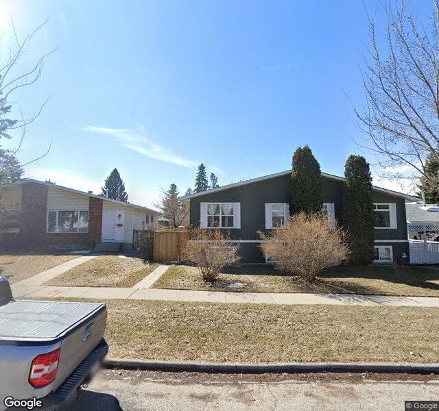Street view of 217 Queensland Place SE, Calgary