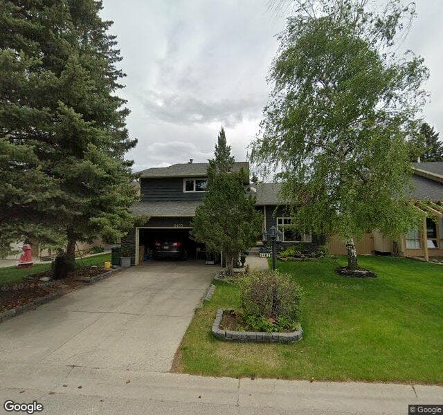 Street view of 2403 Deer Side Drive SE, Calgary