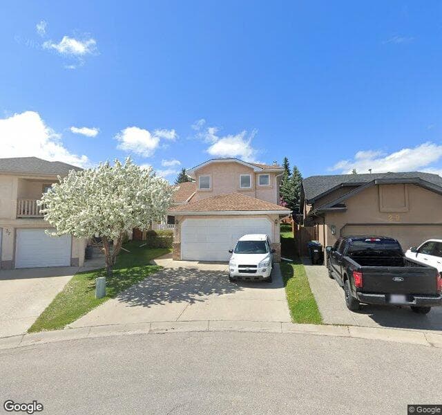 Street view of 33 Millbank Bay SW, Calgary