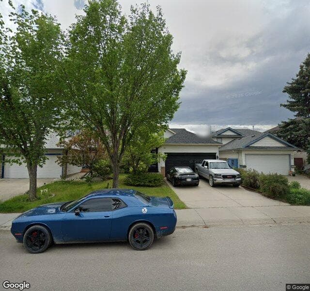 Street view of 662 Harvest Hills Drive NE, Calgary