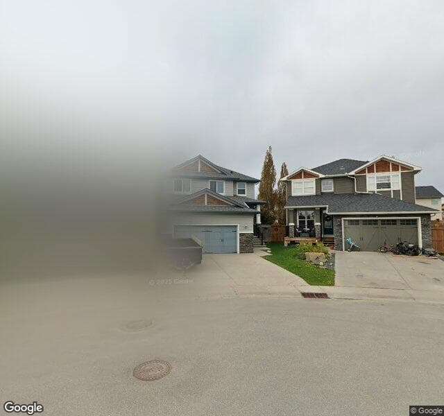 Street view of 62 Silverado Skies Crescent SW, Calgary