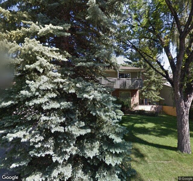 Street view of 607 Woodpark Crescent SW, Calgary