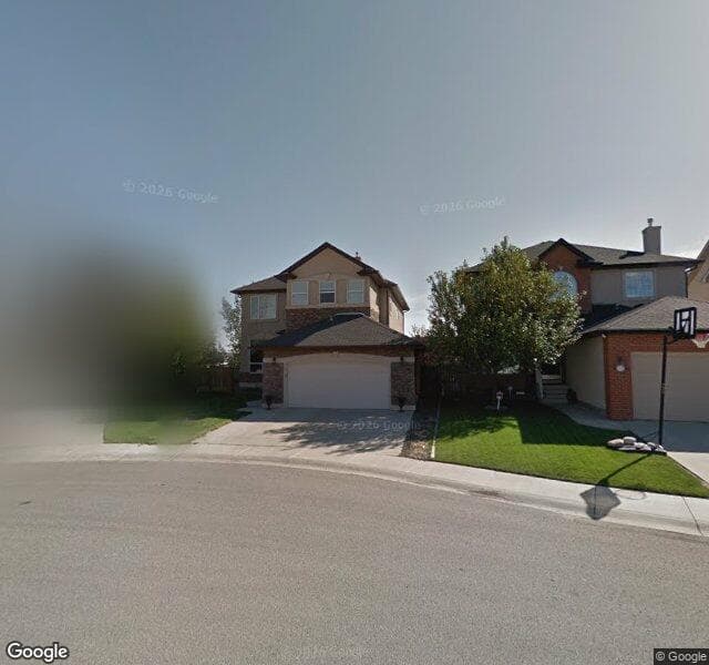 Street view of 26 Strathlea Crescent SW, Calgary