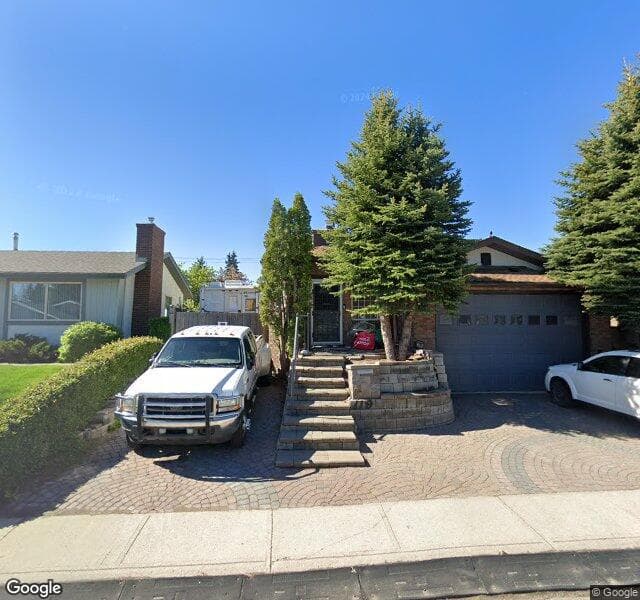 Street view of 119 Cedarpark Drive SW, Calgary