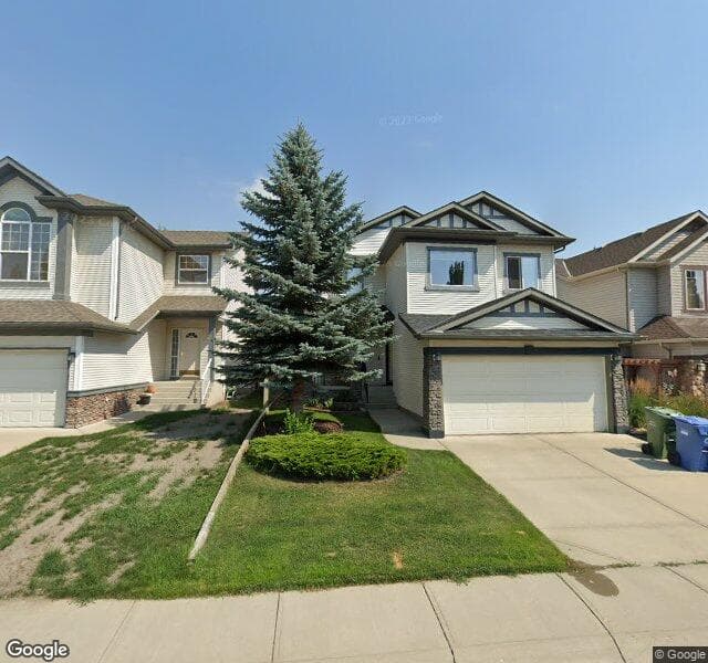 Street view of 74 Cougarstone Circle SW, Calgary