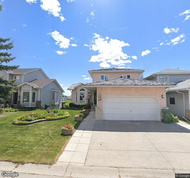 Street view of 34 Hawkdale Circle NW, Calgary