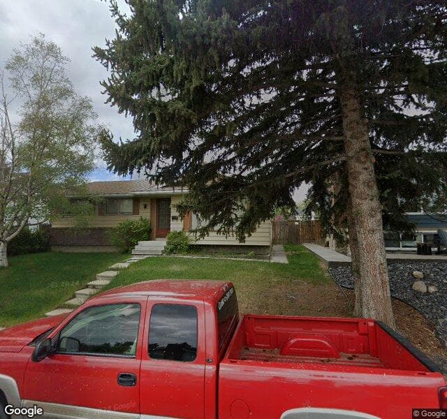 Street view of 303 Queensland Circle SE, Calgary