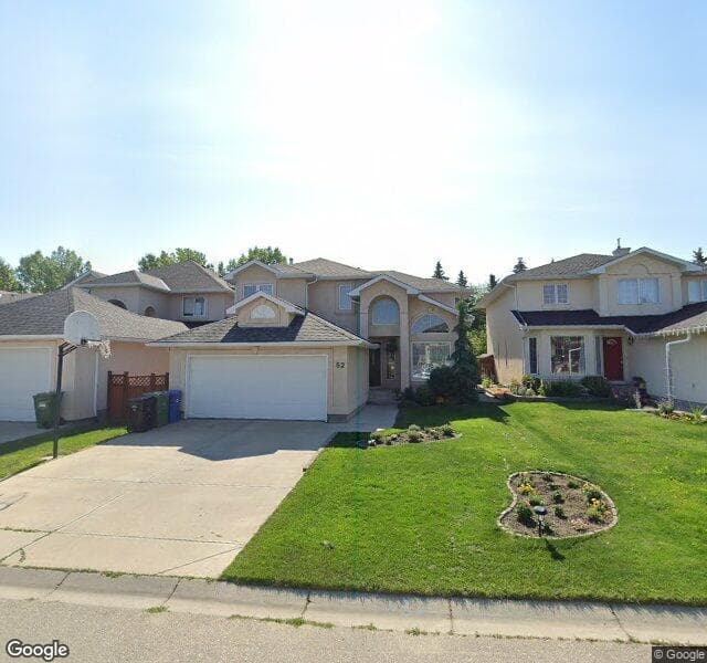 Street view of 52 Mount Copper Green SE, Calgary