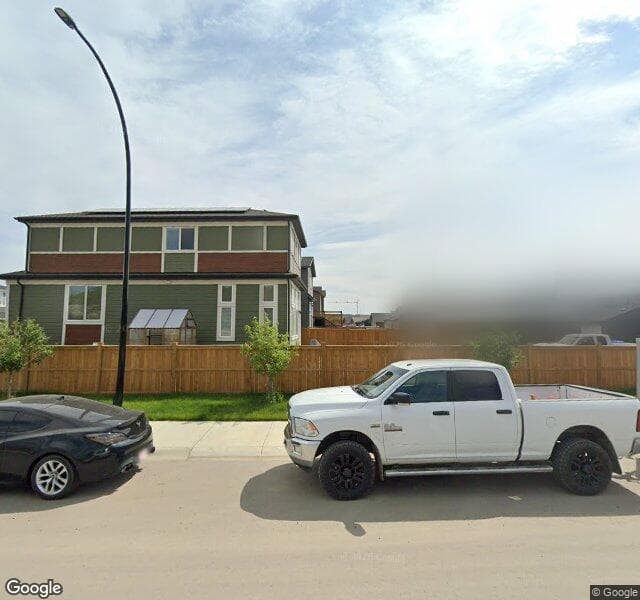Street view of 487 Wolf Creek Way SE, Calgary