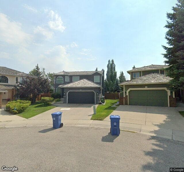 Street view of 315 Woodbriar Circle SW, Calgary