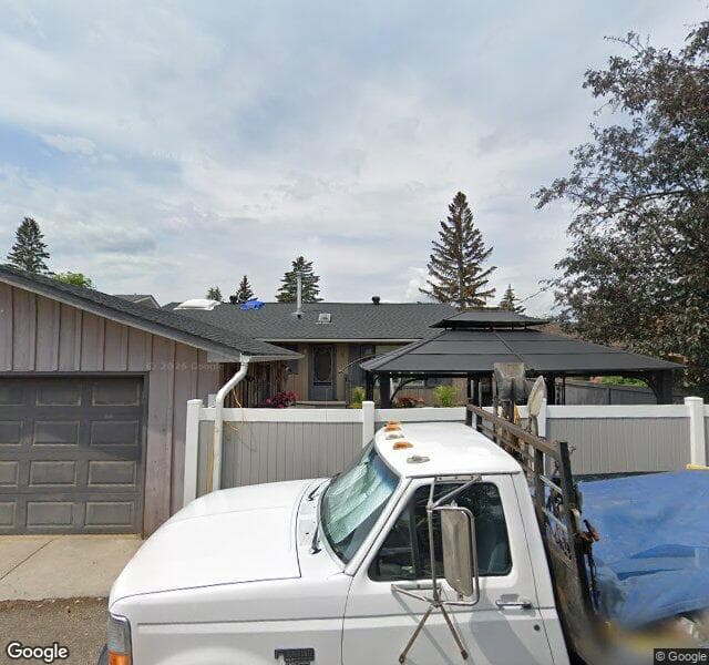 Street view of 783 Lake Twintree Crescent SE, Calgary