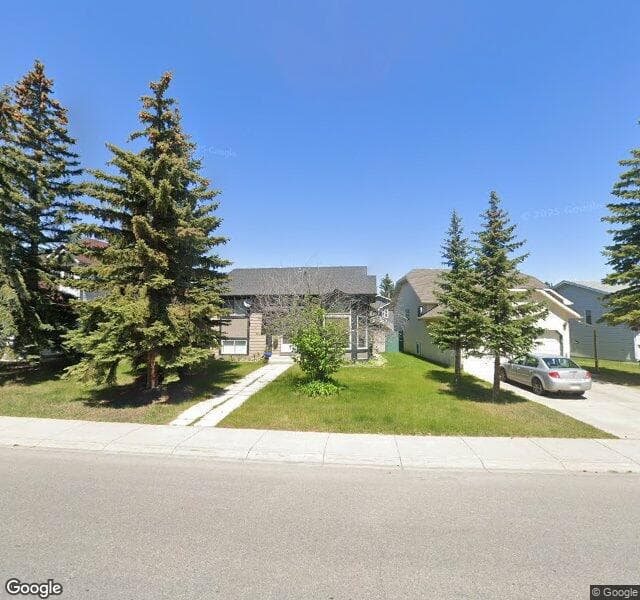 Street view of 911 Harvest Hills Drive NE, Calgary