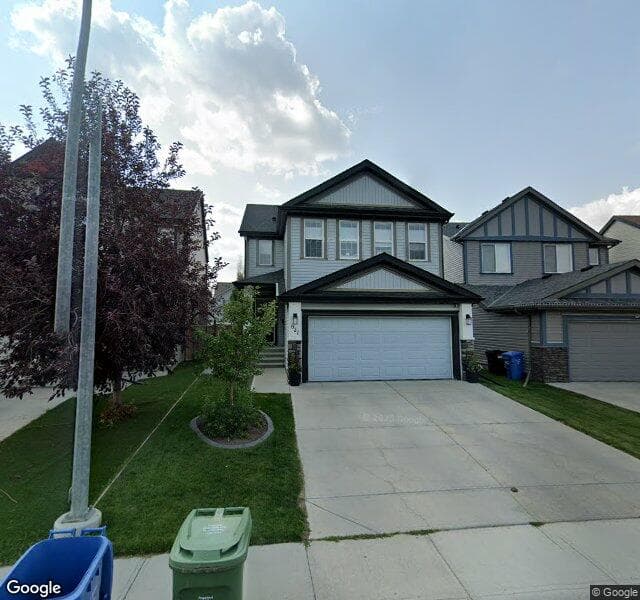 Street view of 627 Copperpond Circle SE, Calgary