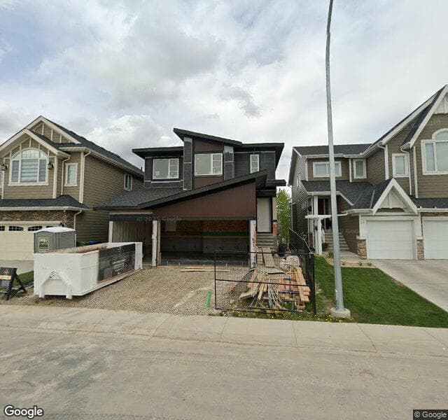 Street view of 18 Rock Lake View NW, Calgary