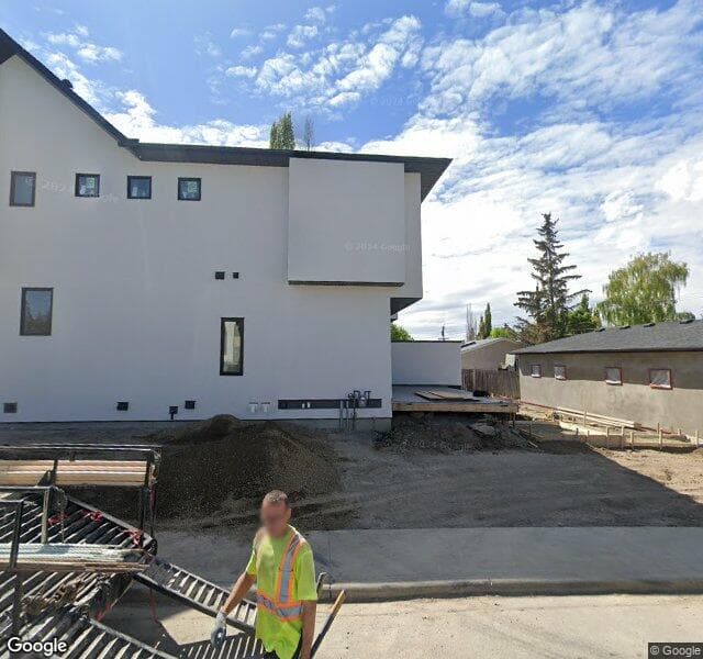 Street view of 702 26 Avenue NW, Calgary