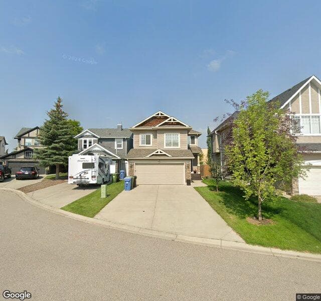 Street view of 43 Cougarstone Park SW, Calgary