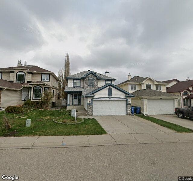 Street view of 87 Hidden Ridge Close NW, Calgary