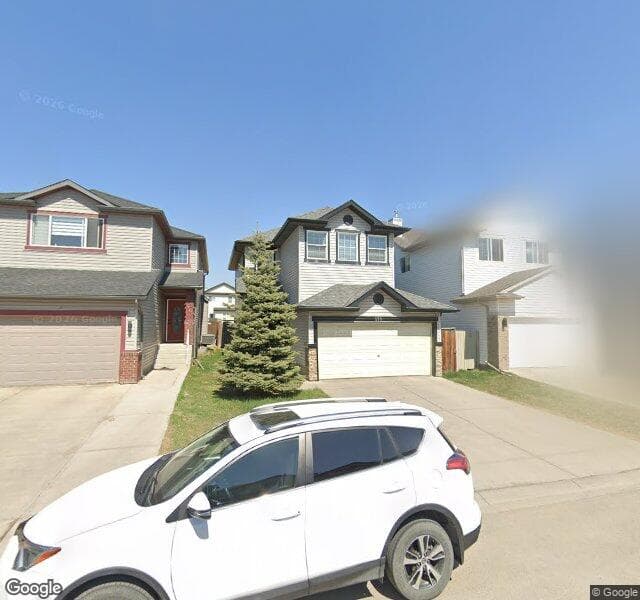 Street view of 153 Saddlecrest Place NE, Calgary