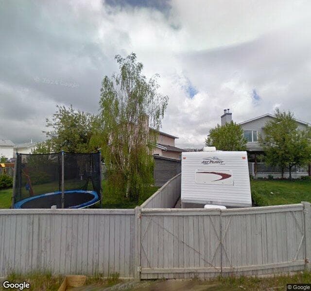 Street view of 51 Riverwood Court SE, Calgary