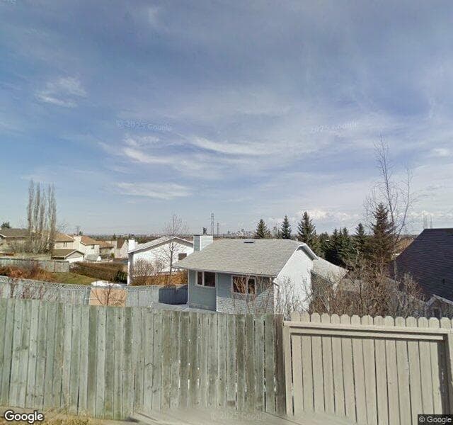 Street view of 48 Strathearn Rise SW, Calgary