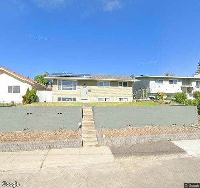 Street view of 7015 Huntercrest Road NW, Calgary