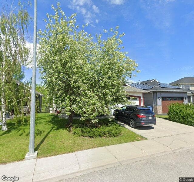 Street view of 100 Douglas Shore Close SE, Calgary