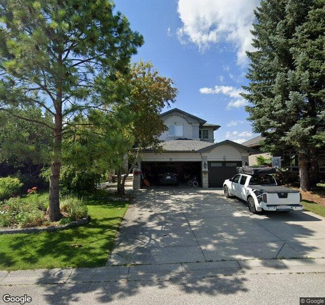 Street view of 49 Sunset Way SE, Calgary