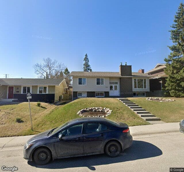 Street view of 1147 Lake Sylvan Drive SE, Calgary