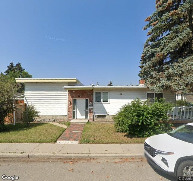 Street view of 903 68 Avenue SW, Calgary