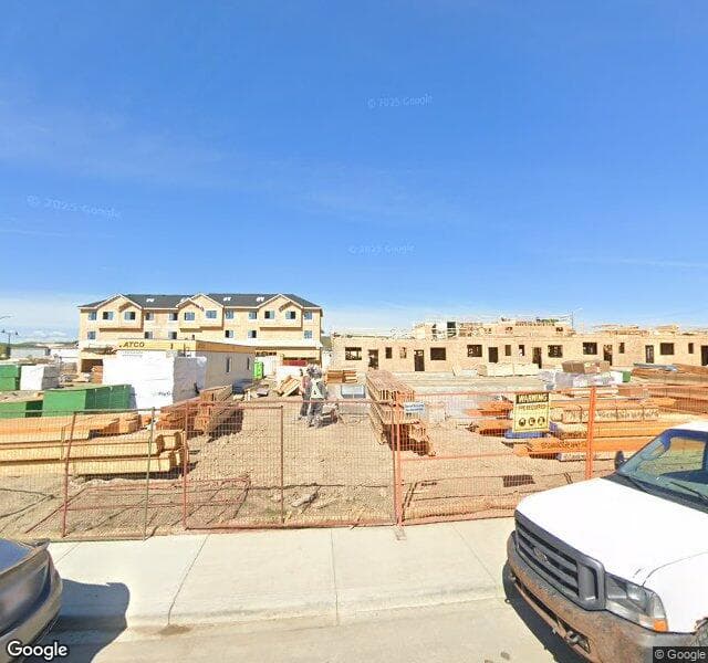 Street view of 46 Creekside Way SW, Calgary