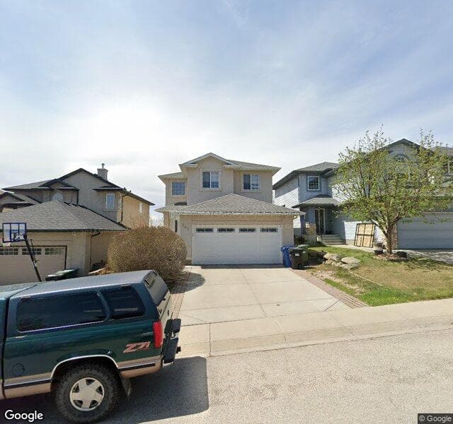 Street view of 248 Tuscany Ridge View NW, Calgary