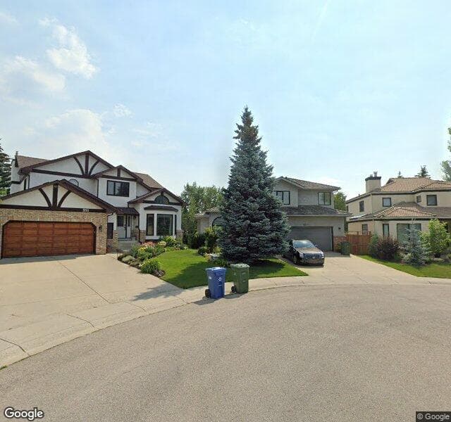 Street view of 355 Woodbriar Circle SW, Calgary