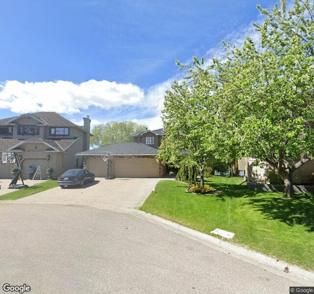Street view of 222 Mckenzie Lake Bay SE, Calgary