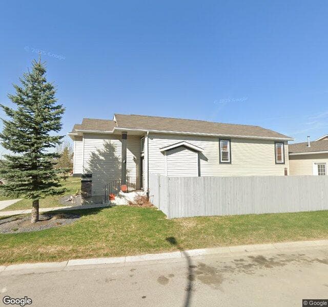 Street view of 46 Covecreek Place NE, Calgary