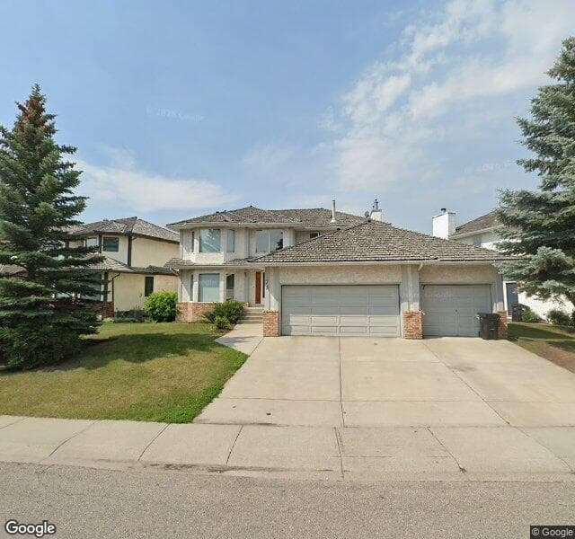Street view of 273 Woodbriar Circle SW, Calgary