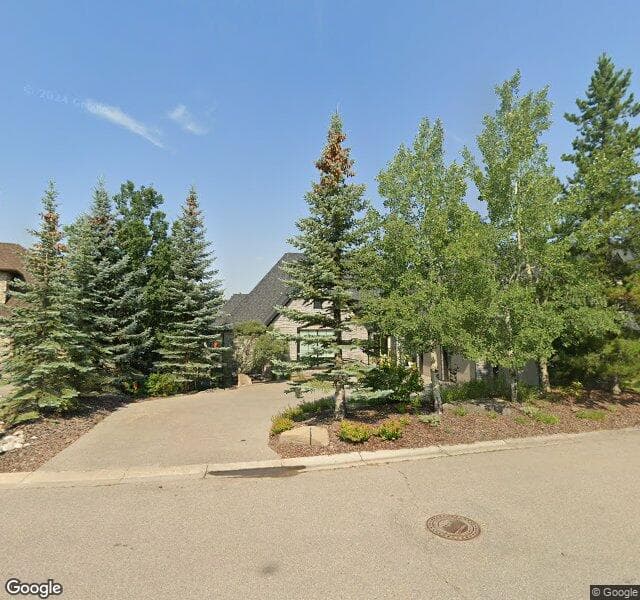 Street view of 38 Spring Willow Way SW, Calgary