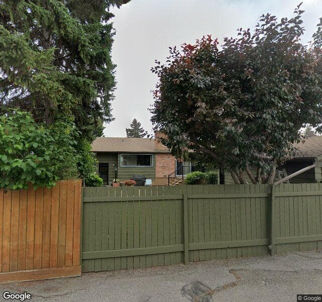 Street view of 115 Lake Lucerne Close SE, Calgary
