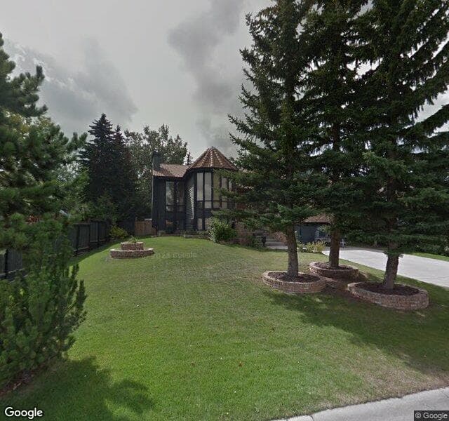 Street view of 511 Coach Grove Road SW, Calgary
