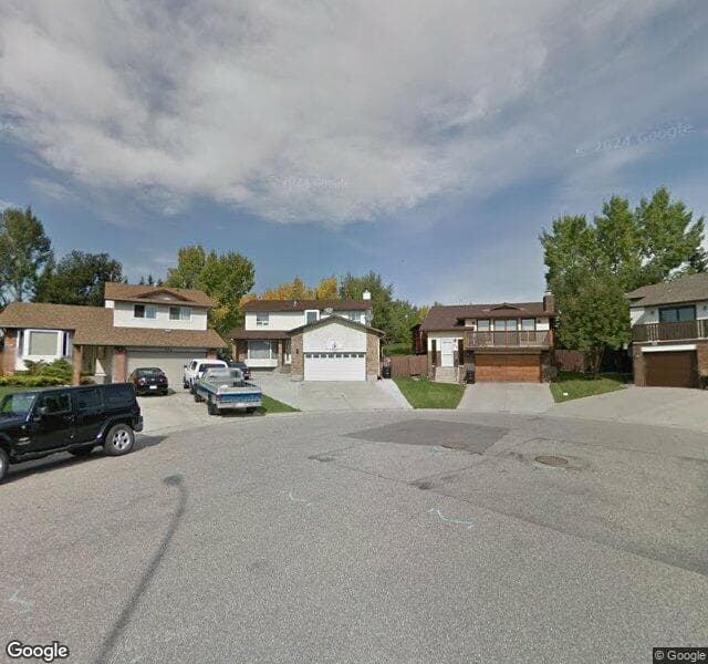 Street view of 232 Ranchridge Bay NW, Calgary