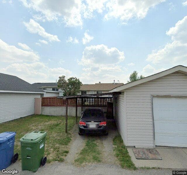 Street view of 1328 Falconridge Drive NE, Calgary