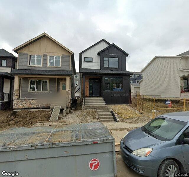 Street view of 173 Treeline Avenue SW, Calgary